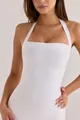 Detailed close-up of a white halter bandage dress highlighting the ribbed fabric texture - XS / Dresses / White