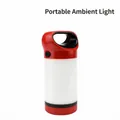 Portable red and white LED camping lantern with handle for outdoor tents and emergency lighting - Red