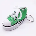 Green miniature canvas sneaker keychain and motorcycle kickstand shoe cover accessory - Green