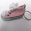 Pink mini canvas sneaker keychain and kickstand decorative shoe cover - Pink