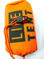 Compact orange emergency tent in storage bag with LIFE TENT logo for outdoor survival - Tent with Whistle Storage Bag / Orange