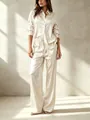 Elegante conjunto de dos piezas en satén champán con camisa de manga larga y pantalón - XS / Top Y Pantalón / Blanco Roto