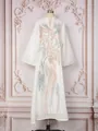 Close-up of elegant white V-neck kaftan dress featuring gold and blue sequin embroidery. - S / Dresses / White