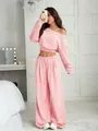Detailed view of women's pink off-shoulder crop top and high-waist wide-leg sweatpants - S / Top And Bottom / Pink