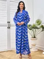 Elegante koningsblauwe maxi-jurk met gouden chevron strass patroon en lange mouwen - S / Dresses / Koningsblauw