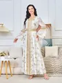 Elegante witte maxi-jurk met ingewikkelde gouden borduursels en strass-bladdetails. - S / Dresses / Wit (197)