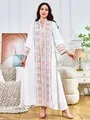 Elegante witte maxi-jurk met lange mouwen, kleurrijke etnische borduursels en pailletten. - S / Dresses / Wit