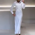 Detailed view of the elegant long sleeves and matching belt on this white polo collar dress - XS / Dresses / White