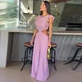 Stylischer pinkfarbener Jumpsuit mit weitem Bein, Rüschenärmeln und Cut-out an der Taille. - S / Kleider / Rosa