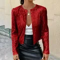 Detail showing texture of women's red sequined cropped jacket for fashion styling. - S / Tops / Red