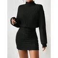Elegante vestido corto ajustado negro de cuello alto y manga larga en punto de canalé - S / Vestidos / Negro