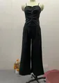 Komplettes Set aus schwarzem Schnür-Camisole-Top und passender weiter Hose an Schaufensterpuppe - XS / Oben Und Unten / Schwarz