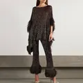 Close-up detail of sequin fabric and luxury feather trim on elegant two-piece set - S / Top And Bottom / Black