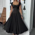 Elegante Franse stijl zwarte mouwloze maxi-jurk met vierkante hals en slanke taillelijn - XS / Dresses / Zwart