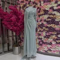 Elegant light green floor-length dress with irregular pleats and slim fit design - XS / Dresses / Light Blue