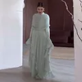 Elegant light green pleated maxi dress with ruffled long sleeves and high neck - Light Green