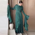 Elegant dark green pleated long dress with flared sleeves and unique draped shawl collar. - Malachite green