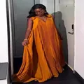 Elegant sleeveless V-neck pleated maxi dress in vibrant orange featuring a loose fit - One Size / Dresses / Chocolate