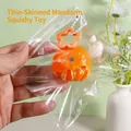 Realistic peeled orange squishy toy in transparent bag with orange star clip keychain - Orange Squishy With Keychain