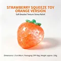 Orangefarbenes erdbeerförmiges Squishy-Stress-Spielzeug mit Perlentextur zur Entspannung - 7x6cm / Orange