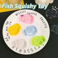Transparante visvormige squishy-speeltjes in diverse kleuren op bord - Ijsdoorzichtig Taiyaki Squishy