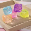 Gros plan de cubes spongieux à paillettes colorées pour soulager le stress en plateau - Forme de bloc / 4.0 Spécification (4cm) / Bleu
