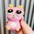 Cute pink dragon squeeze toy with big bulging eyes and heart horns for stress relief - Pink Dragon / Pink