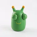 Green pop-eye dragon squeeze toy for stress relief with a cute cartoon alien design - Popping Eye Worm / Green