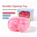 Pink numeric 67 squishy stress relief toy made of soft TPR material with gift box - Box Packaging / Pink