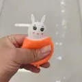 Divertido juguete de silicona con forma de zanahoria y conejo blanco para aliviar estrés - Naranja Y Blanco