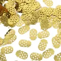 Macro view of golden pineapple-shaped party confetti featuring heart-shaped cutouts - Pineapple / 15g Pack / Gold