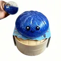 Nahaufnahme eines blauen Glitzer-Knödel-Squishy-Spielzeugs im Dämpfkorb-Behälter - Glitzer Gel Ausdruck Brötchen Dunkelblau Mit Dämpfer / 1 Stück