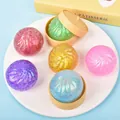Vista dettagliata di colorati giocattoli squishy baozi glitterati con cestini per vapore - Stile Paillettes Multicolore (Con Base Vaporiera) / Colore Casuale