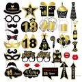 Detailed view of 18th birthday party photo booth props set in black and gold - 18th Birthday Photo Props