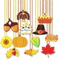 Detail view of Thanksgiving bead necklaces featuring pumpkin and maple leaf charms. - Thanksgiving Bead Chain / 12pcs Set