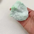 Macro view of handmade creamy white pearl texture squishy toy showing tactile details - Ultra-thin Ice Crust Handmade Ball / Green