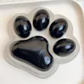 Detailansicht eines riesigen transparenten Katzenpfoten-Squishys mit schwarzen Polstern - Jumbo Schwarz Transparent Katzenpfote