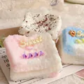 Macro detail of silicone mud strawberry toast squeeze toy showing soft fluffy texture - Strawberry Thick Toast