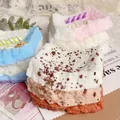 Nahaufnahme von Schokoladen-Toast-Squishy-Spielzeugen mit weicher, realistischer Textur. - Schokolade Dicker Toast