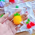 Mini pineapple fruit squishy toy made of soft TPR rubber in a clear bag with chain - Mini Pineapple / PVC Bag + Chain