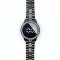 Detail of a black women's LED watch featuring a rhinestone bezel and metallic band. - White / Black