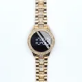 Detailed view of women's gold-tone LED watch with rhinestone bezel and steel link strap - White / Rose Gold