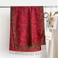 Elegant red paisley scarf with fringe tassels shown in a stylish fashion display - Wine Red Style (WT328-3) / 190x69cm
