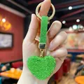 Detailed view of a glittering green rhinestone heart keychain with matching strap - 5*4.5 / Rhinestone Heart Pendant (Green)