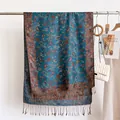 Detailed view of blue paisley imitation cashmere scarf with elegant tassels on a rack - Lake Blue Style (WT328-4) / 190x69cm