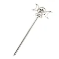 Detailed macro view of silver-tone vintage alloy hair stick with moon and pentagram motifs - Silver