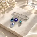 Elegant silver Evil Eye and Hamsa Hand charm brooch pin with clear rhinestone accents - Tassel Evil Eye Hamsa Style (Z164-4) / Silver