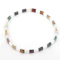 Bohemian Tila bead bracelet featuring colorful mixed geometric beads on white background - Amber/Red/Blue Mixed