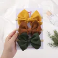 Baby girl bow nylon headband set in mustard yellow, brown, and green bubble fabric - 3D