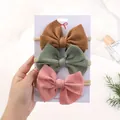 Three-piece baby girl elastic nylon headbands with textured bubble fabric bows - 3.00g